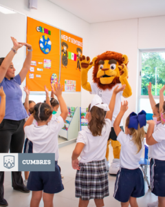 Alumnas y maestra de primaria con mascota de TID